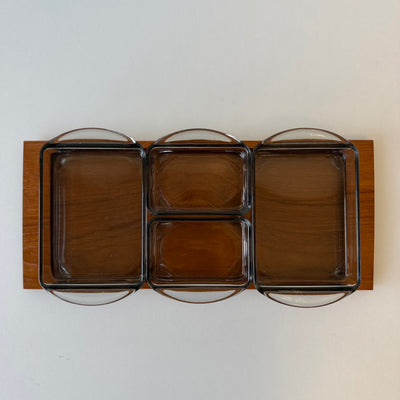 
                  
                    Vintage serveerschaaltje teak met 4 glazen bakjes
                  
                