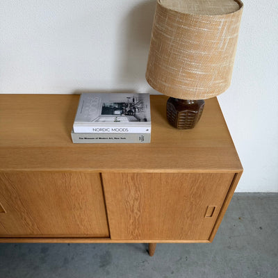 
                  
                    Vintage eiken lowboard schuifdeuren
                  
                