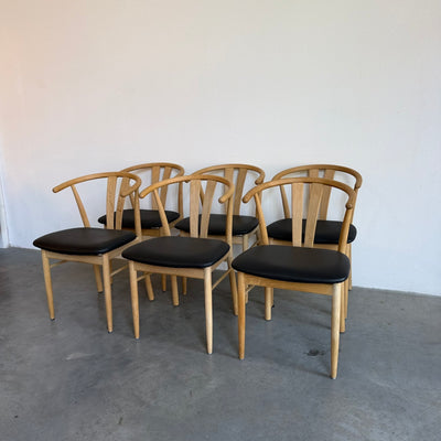 
                  
                    Set van 6 eiken Deense eetkamerstoelen
                  
                