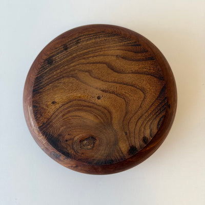 
                  
                    Vintage schaal teak (M)
                  
                