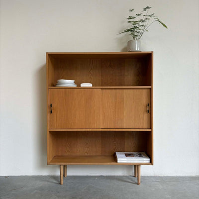 Boekenkast eiken schuifdeur - LOUI.STORE