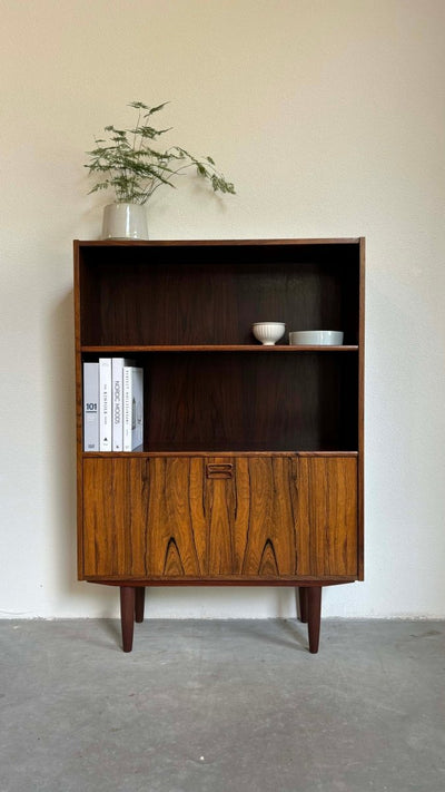 
                  
                    Boekenkast klapdeur palissander - LOUI.STORE
                  
                