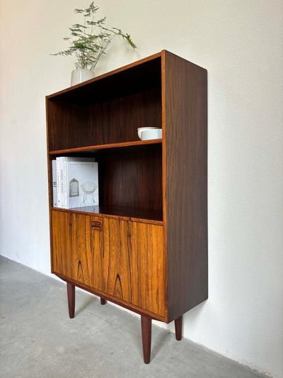 
                  
                    Boekenkast klapdeur palissander - LOUI.STORE
                  
                