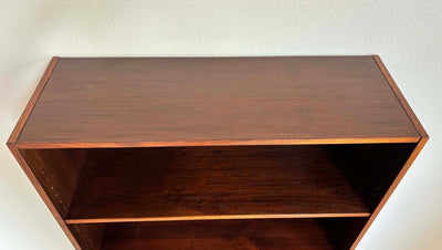 
                  
                    Boekenkast klapdeur palissander - LOUI.STORE
                  
                