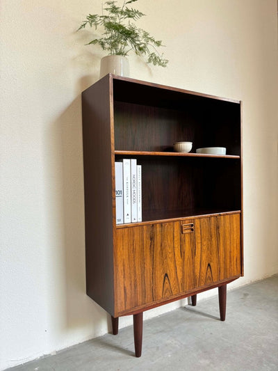 
                  
                    Boekenkast klapdeur palissander - LOUI.STORE
                  
                