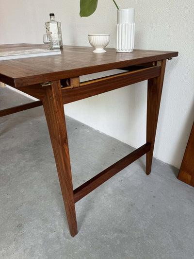 
                  
                    Eettafel Poul Cadovius met klapbladen - LOUI.STORE
                  
                