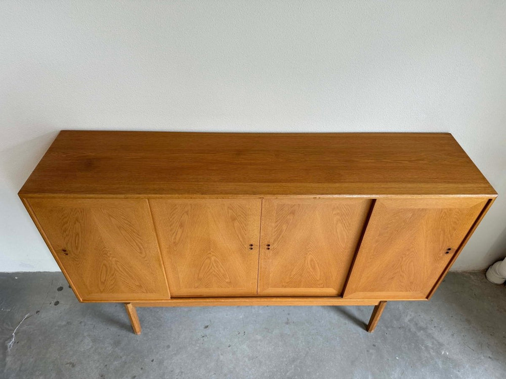 
                  
                    Highboard eiken Jensen & Rasnov - LOUI.STORE
                  
                