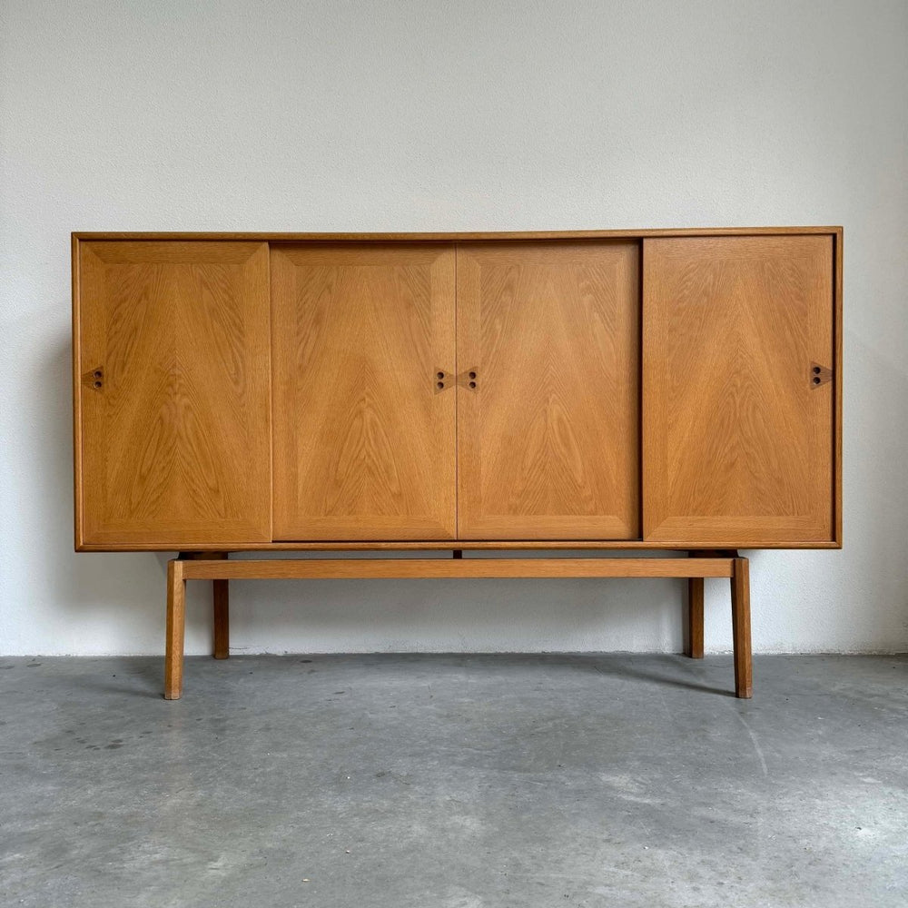 
                  
                    Highboard eiken Jensen & Rasnov - LOUI.STORE
                  
                