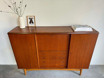 
                  
                    Highboard teak en eiken - LOUI.STORE
                  
                