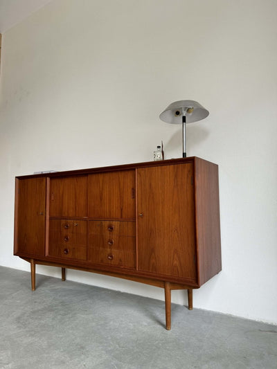 
                  
                    Highboard teak veel vakken - LOUI.STORE
                  
                