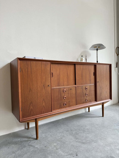 
                  
                    Highboard teak veel vakken - LOUI.STORE
                  
                