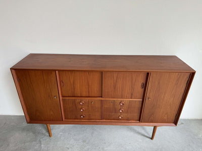 
                  
                    Highboard teak veel vakken - LOUI.STORE
                  
                