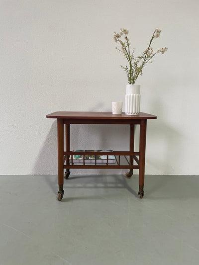 
                  
                    Trolley (bijzettafel) in teak met rek
                  
                