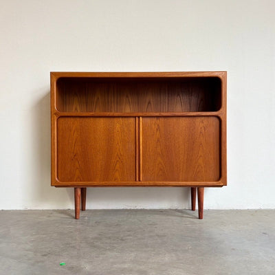 
                  
                    Mid century design highboard - dressoir Dyrlund teak tambour - LOUI.STORE
                  
                