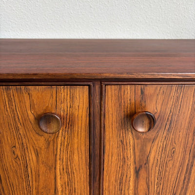 
                  
                    Mid Century sideboard palissander ronde knopjes - LOUI.STORE
                  
                