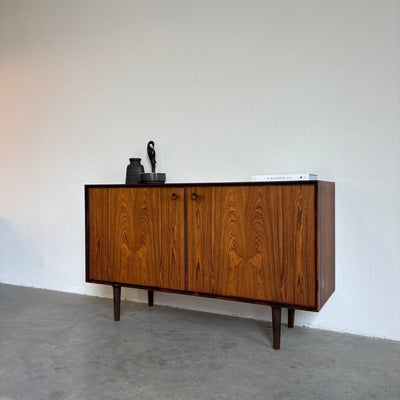 
                  
                    Mid Century sideboard palissander ronde knopjes - LOUI.STORE
                  
                