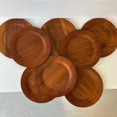 
                  
                    Set van 8 vintage teak borden - LOUI.STORE
                  
                