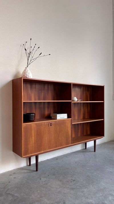 
                  
                    Vintage boekenkast klep teak 180cm - LOUI.STORE
                  
                