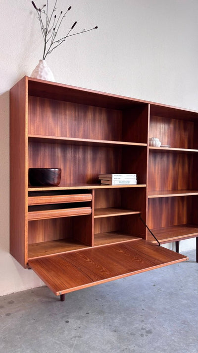 
                  
                    Vintage boekenkast klep teak 180cm - LOUI.STORE
                  
                