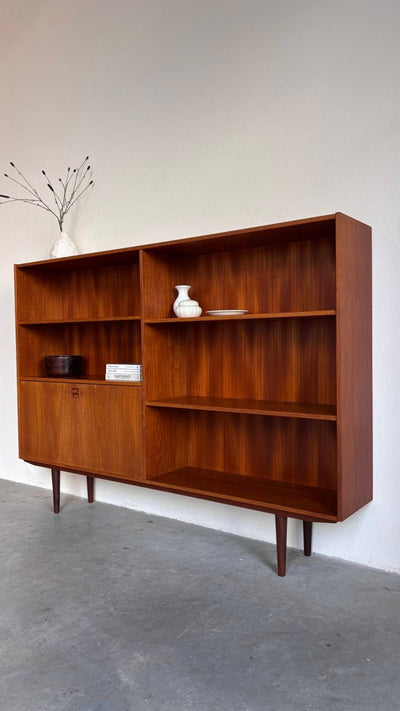 
                  
                    Vintage boekenkast klep teak 180cm - LOUI.STORE
                  
                
