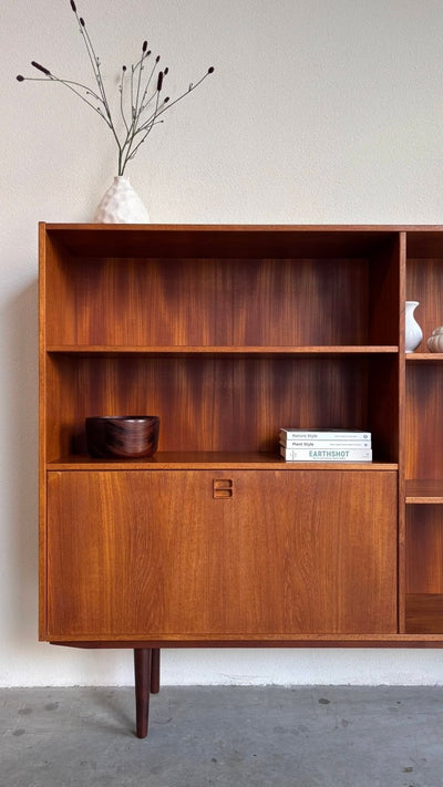 
                  
                    Vintage boekenkast klep teak 180cm - LOUI.STORE
                  
                