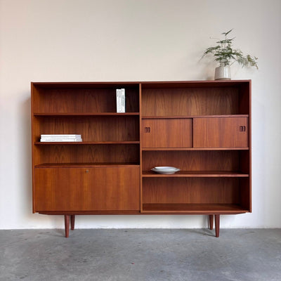 Vintage boekenkast schuifdeur+klep teak - LOUI.STORE
