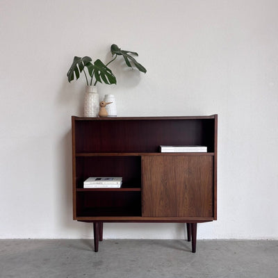 
                  
                    Vintage boekenkast schuifdeurtjes palissander - LOUI
                  
                