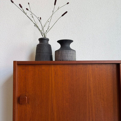 
                  
                    Vintage Domino sideboard teak - schuifdeuren & open vak - LOUI
                  
                