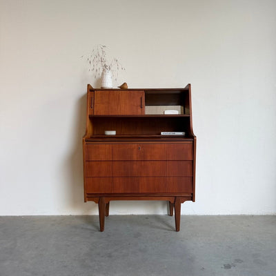 
                  
                    Vintage secretaire lades en kleine schuifdeurtjes teak - LOUI
                  
                