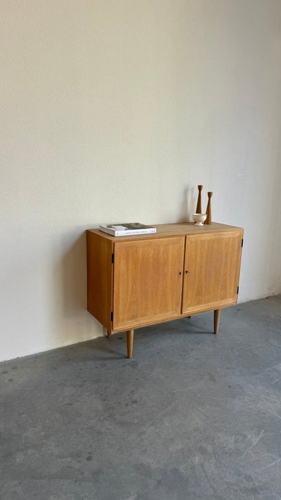 
                  
                    Vintage sideboard Kai Windig eiken - LOUI.STORE
                  
                
