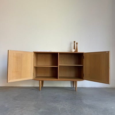 
                  
                    Vintage sideboard Kai Windig eiken - LOUI.STORE
                  
                