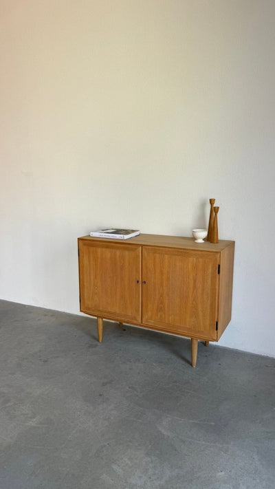 
                  
                    Vintage sideboard Kai Windig eiken - LOUI.STORE
                  
                