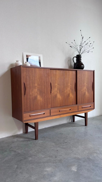 
                  
                    Vintage strak highboard teak - LOUI.STORE
                  
                