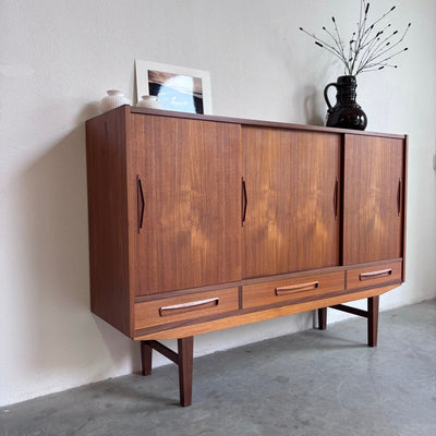 
                  
                    Vintage strak highboard teak - LOUI.STORE
                  
                