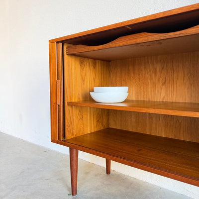 
                  
                    Vintage teak Kai Kristiansen sideboard met tambourdeuren - LOUI
                  
                