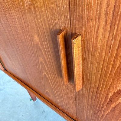 
                  
                    Vintage teak Kai Kristiansen sideboard met tambourdeuren - LOUI
                  
                
