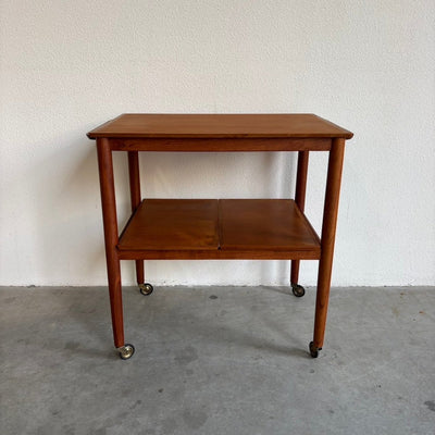 
                  
                    Vintage verlengbare trolley - bijzettafel teak - LOUI.STORE
                  
                