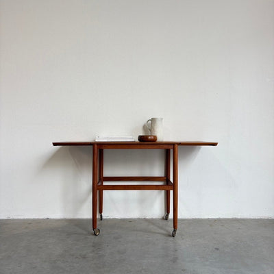 
                  
                    Vintage verlengbare trolley - bijzettafel teak - LOUI.STORE
                  
                