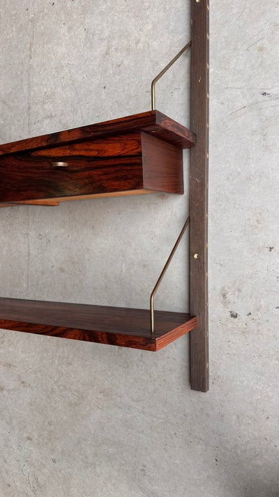 
                  
                    Wandsysteem palissander 2 lades - LOUI.STORE
                  
                