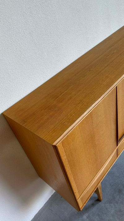 
                  
                    Highboard eiken van E.W. Bach - LOUI.STORE
                  
                