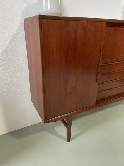 
                  
                    Highboard teak met klep - LOUI.STORE
                  
                