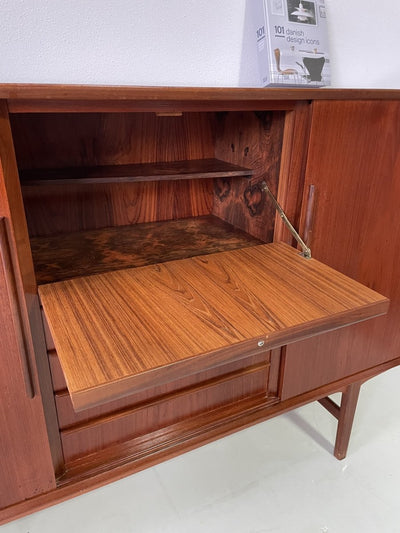 
                  
                    Highboard teak met klep - LOUI.STORE
                  
                
