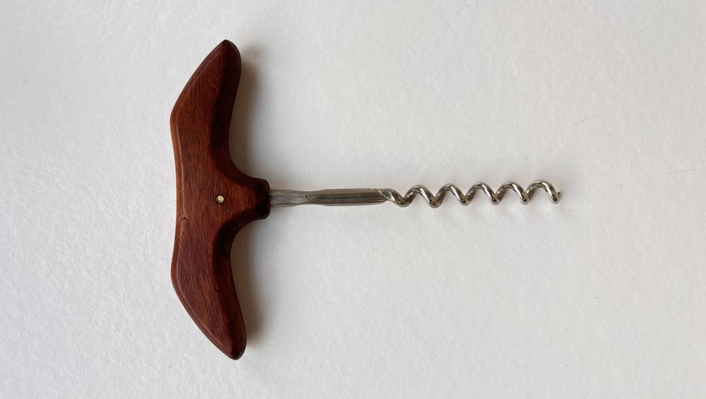 
                  
                    Kurkentrekker teak - LOUI.STORE
                  
                