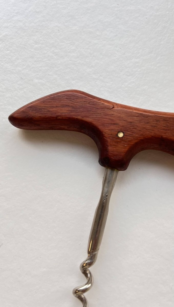 
                  
                    Kurkentrekker teak - LOUI.STORE
                  
                