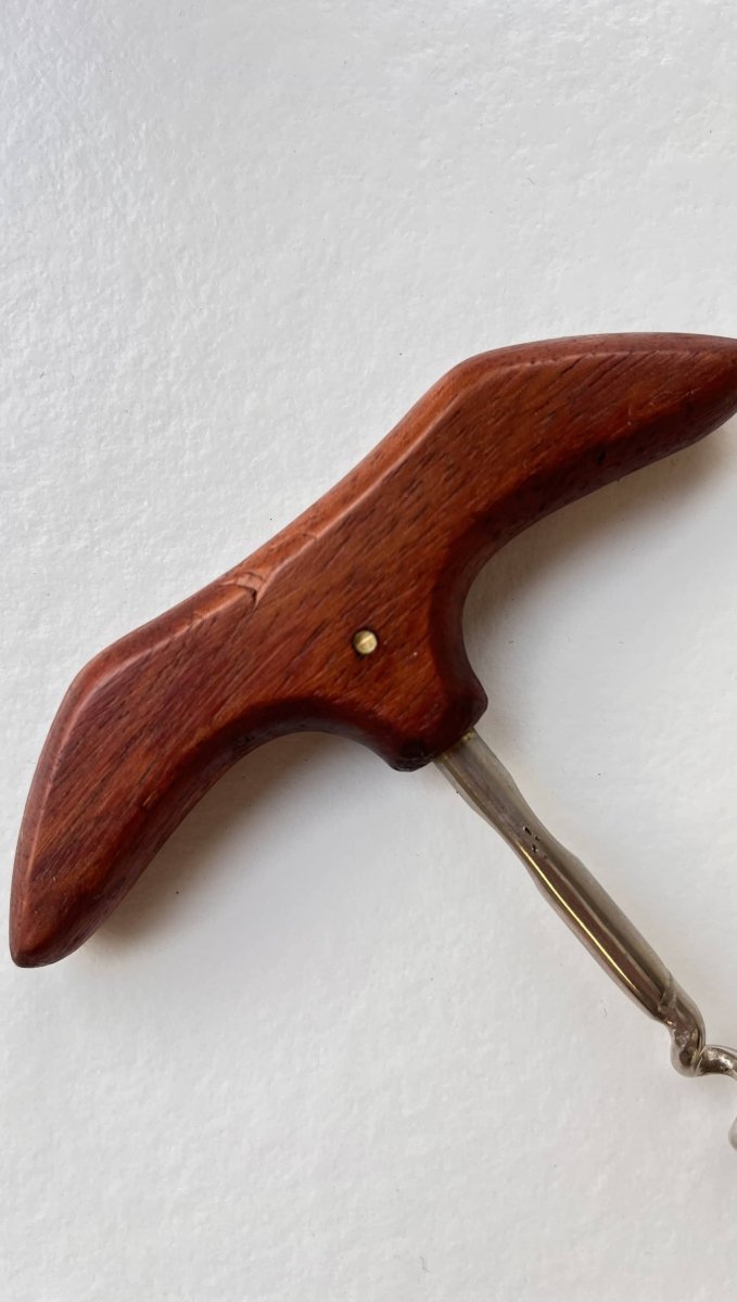 
                  
                    Kurkentrekker teak - LOUI.STORE
                  
                