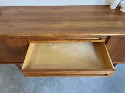 
                  
                    Lowboard teak 4 lades en schuifdeuren - LOUI.STORE
                  
                