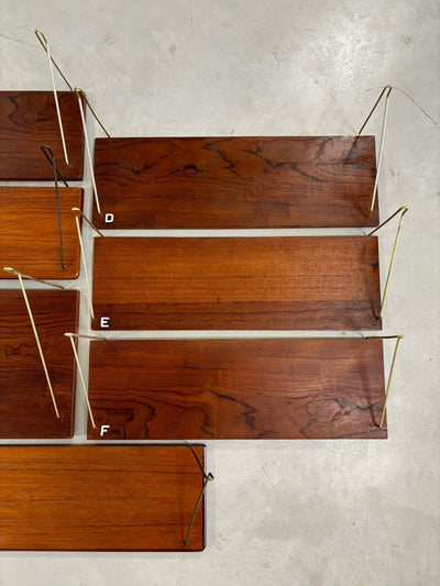 
                  
                    Wandplank teak variaties - LOUI.STORE
                  
                