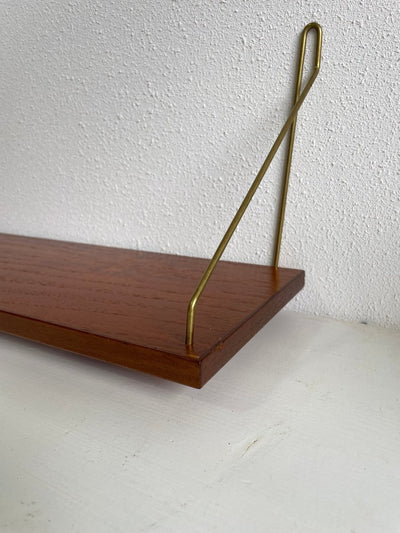 
                  
                    Wandplankje string teak - LOUI.STORE
                  
                
